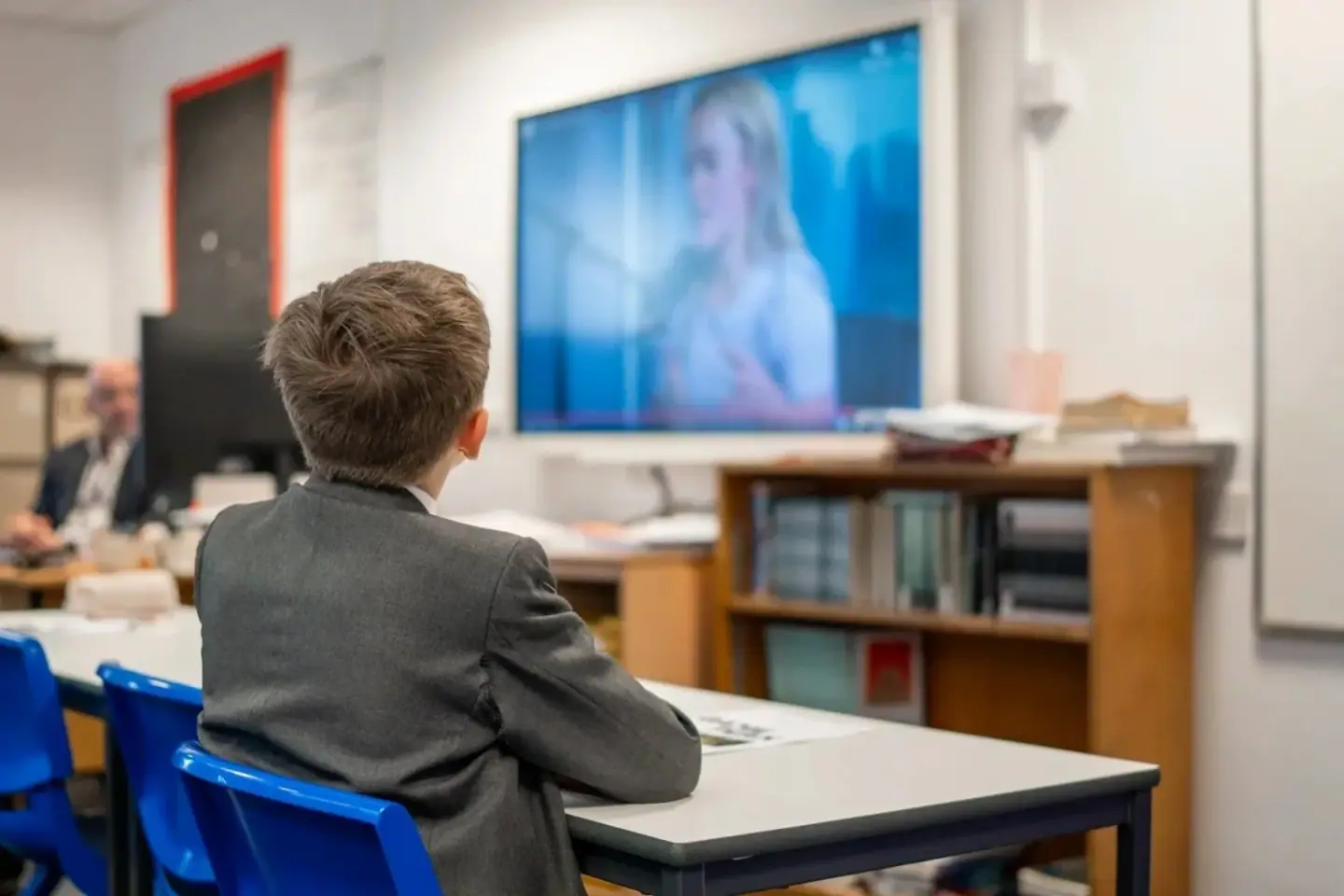 A pupil watching a Game Plan film in class, from the High Performance Foundation's own photography