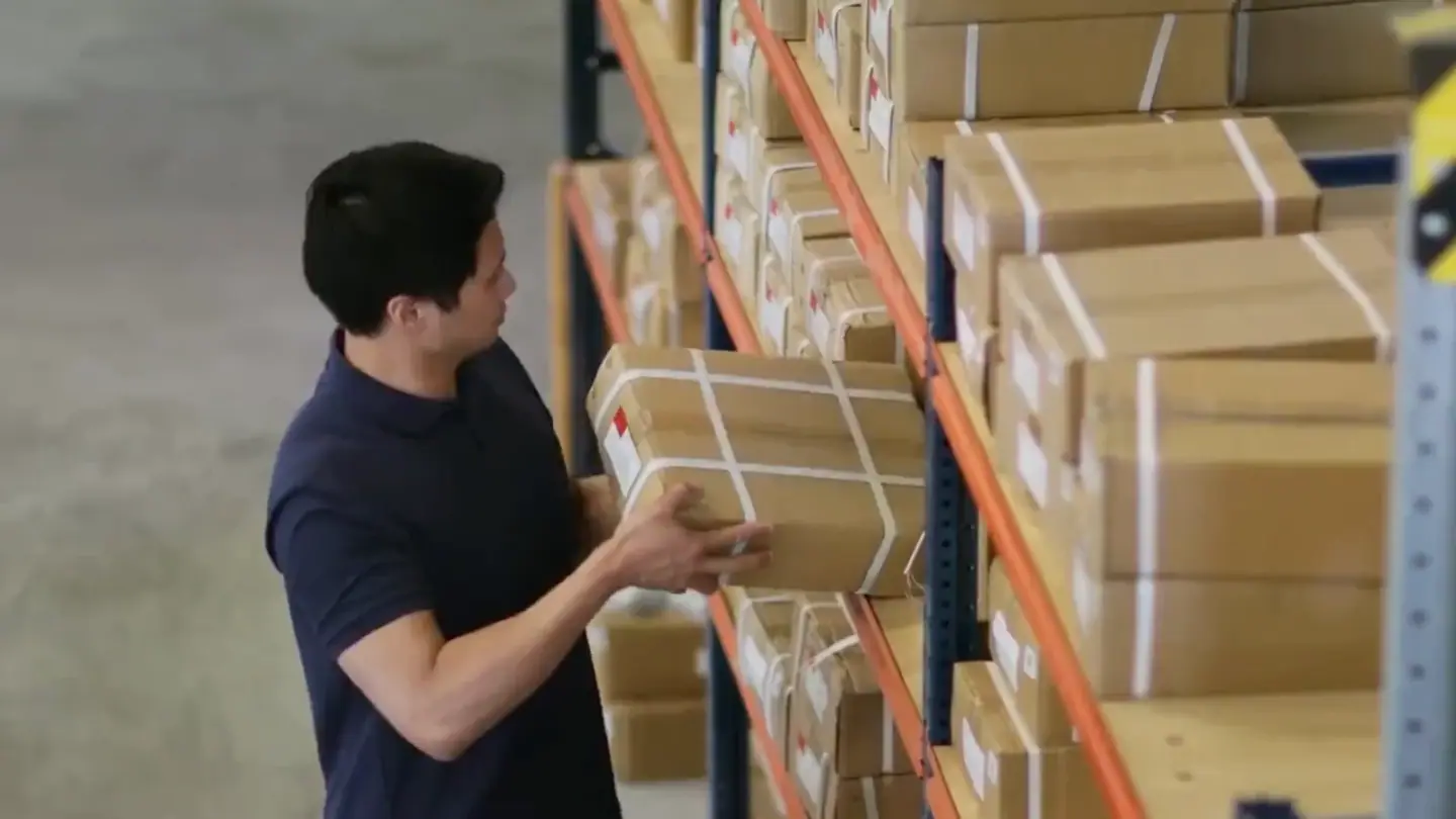 Stacking parcels in a warehouse, from Shippo's own film