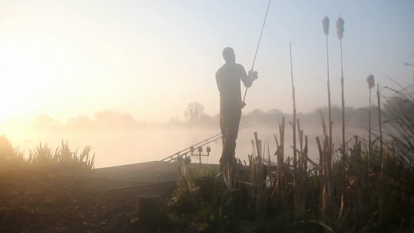 An angler casting into the mist at dawn, from KUMU's film Golden Days