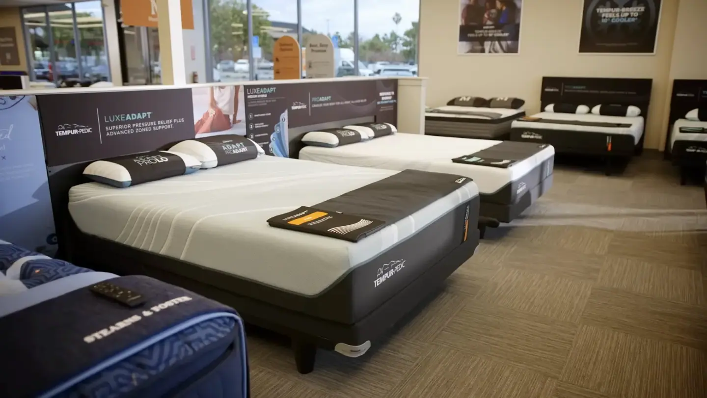 Adjustable beds on display in a Mancini's Sleepworld showroom