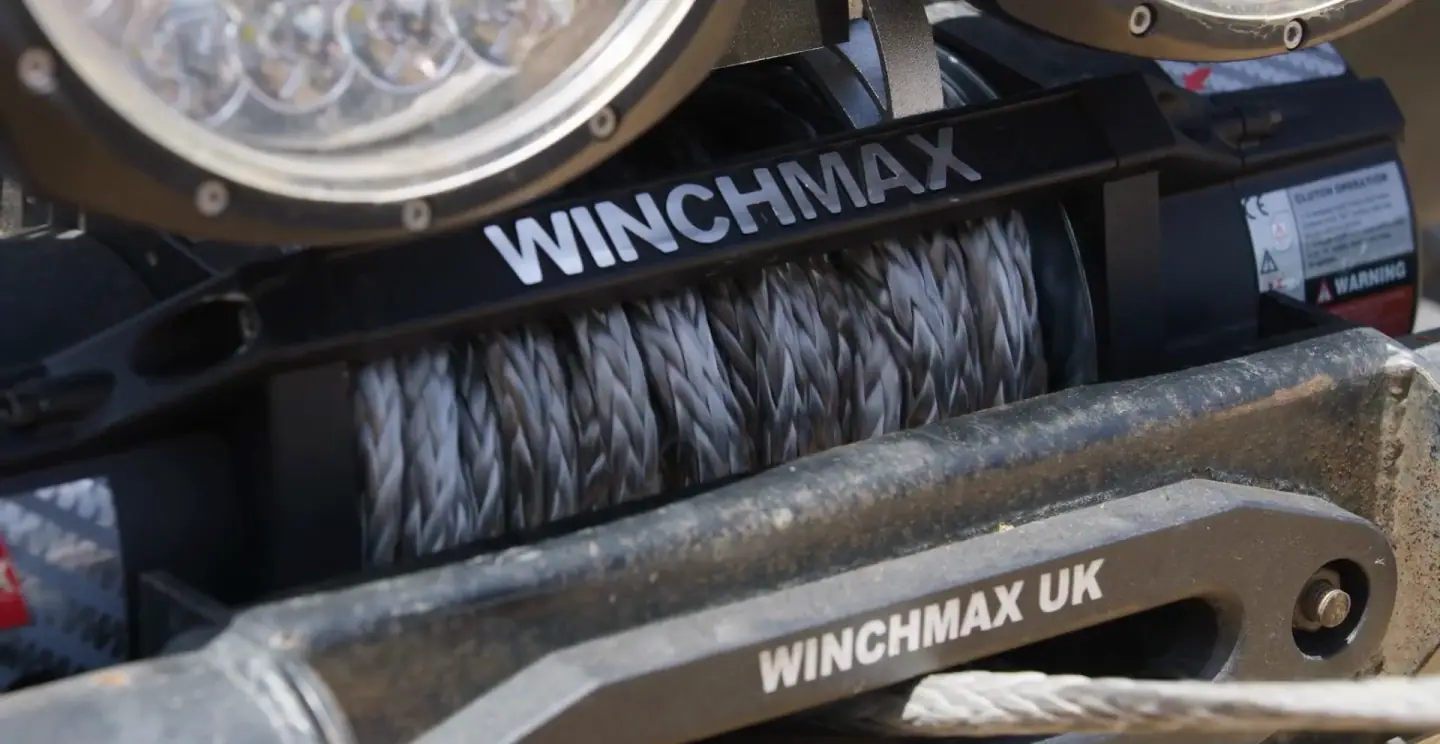 Close-up of a Winchmax winch with synthetic rope and the Winchmax UK fairlead